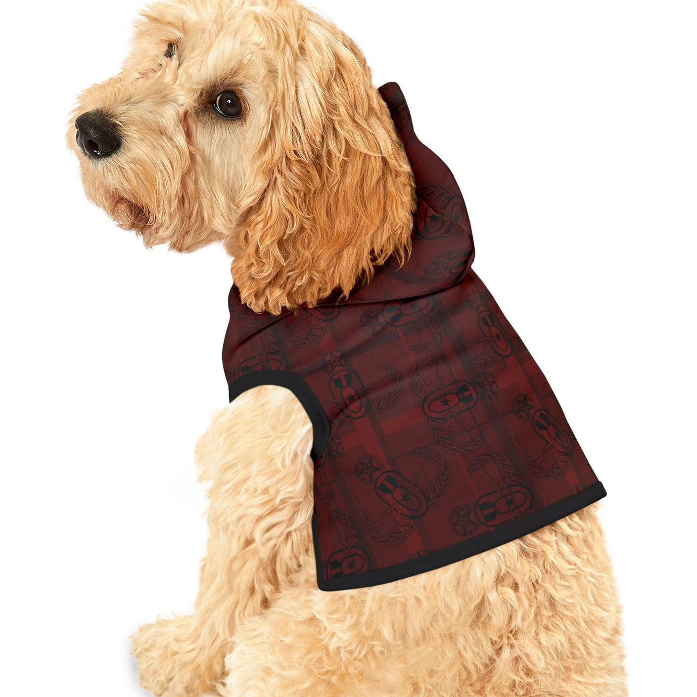 Dog wearing a brown checkered coat on a white background