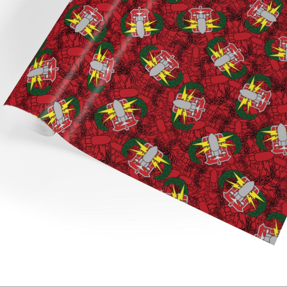 Red wrapping paper with festive design on a white background