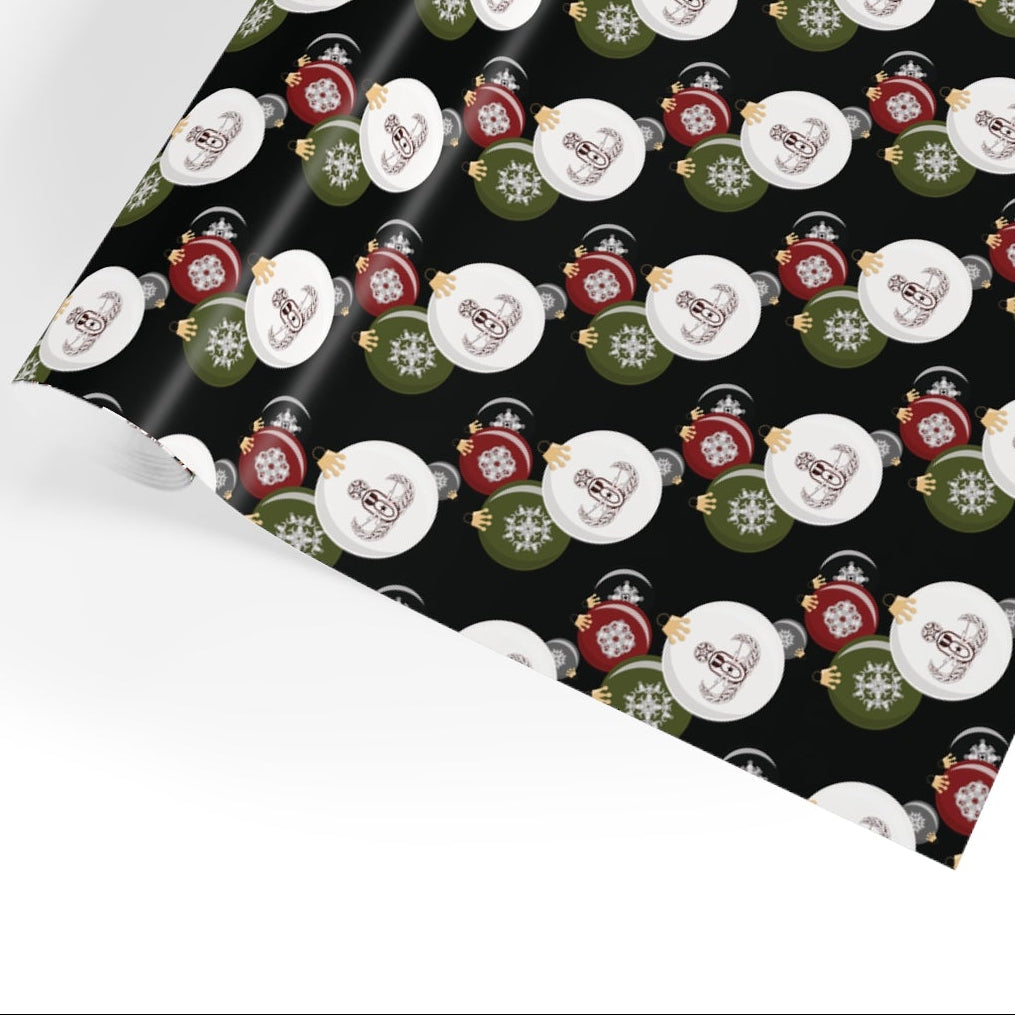 Christmas-themed wrapping paper with festive designs on a black background