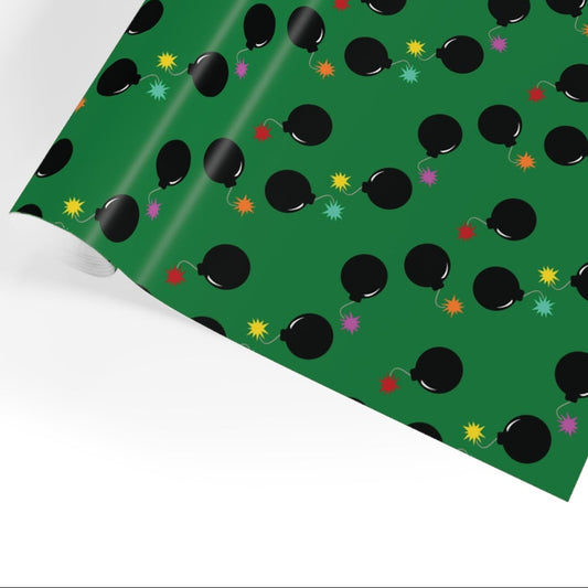 Green fabric with black polka dots on a white background