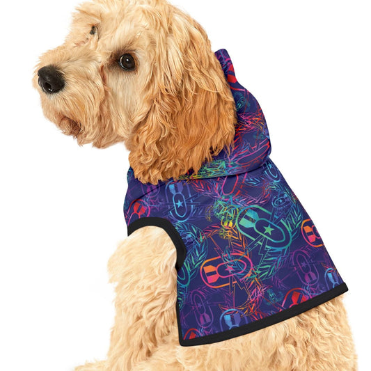 Dog wearing a colorful jacket on a white background