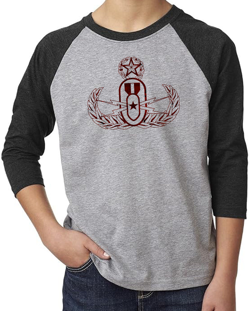 A child modeling a grey and black raglan  3/4 sleeve tee with a red and black plaid EOD Master Badge printed on the front